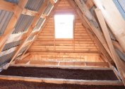 Laying insulation on the attic floor