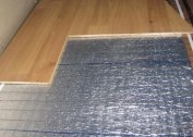 Installation of underfloor heating under the laminate floor