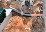 How to remove a sewer pipe from a house under the foundation