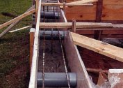 Ventilation of the foundation of a private wooden house: hole patterns and photo formwork