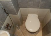 How to hide a sewer pipe in a toilet