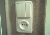 How to connect a three-gang switch with a socket in one housing