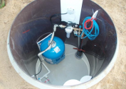 What is a winter version of laying a water pipe from a well to a house?