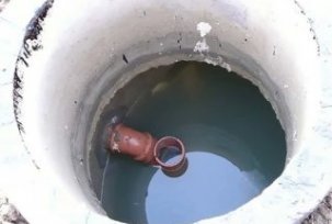 How can I drain the drain pit?