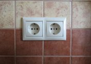 How to install a socket on a tile: how to make a hole