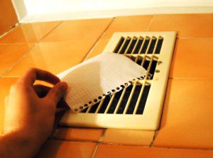 attach a piece of paper to the grate