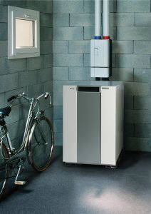 Single-circuit boiler installed on the floor in the utility room
