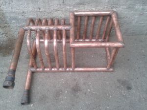 Uncomplicated in design, a home-made heat exchanger will serve for heating the house