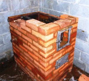 If you install a water heat exchanger in the oven for heating, the whole house will become much warmer