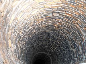 the inner surface of the industrial brickwork pipe with brackets for the movement of workers
