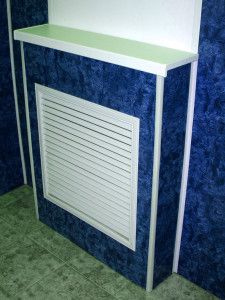 Plastic grille on the heating radiator