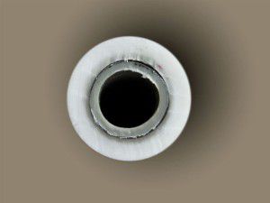 Lamination of a metal-plastic pipe
