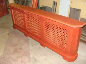 Wooden grille on the radiator