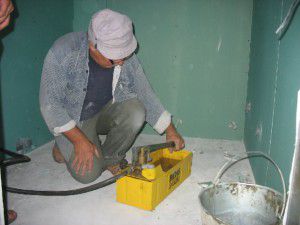 pompe manuelle pour test de pression et remplissage de chauffage avec antigel